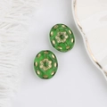 Detail of green Czech glass beads with gold garden floral patterns for DIY jewelry making - Green