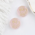 Detail of pink translucent glass cat beads with gold engraved edges for DIY jewelry - Jade Pink