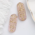 Detail of pink Czech glass bead with gold Egyptian runes for DIY bracelet crafting - Jade Pink