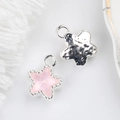 Detailed macro view of 11mm star charms showing pink faceted stone and textured back - Silver Pink / Silver Pink
