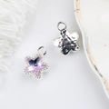 Detail of 11mm star pendant featuring purple zircon and hammered silver texture for DIY jewelry - Silver Base Purple / Silver Base Purple