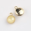 Detail of yellow gemstone pendant with gold beaded edge and hammered texture back - Gold Base Yellow