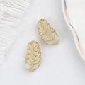 Detail showing frosted glass leaf beads with gold leaf veins for jewelry making - White (00590201)