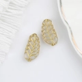 Detail of 15x7mm Czech glass leaf beads with gold gilding for DIY jewelry making - Transparent (00591201)