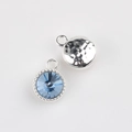 Close-up of light blue crystal pendants with silver metal frames for DIY jewelry making - Silver Base Blue