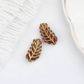 Detail of 15x7mm amber glass leaf beads with gold veining for vintage jewelry making - Brown (00592101)