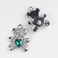 Detail of silver bear pendant with pave rhinestones and green heart-shaped gemstone - Silver Green