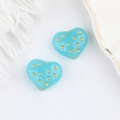 Dettaglio di perle in vetro ceco a forma di cuore blu cielo con pois dorati fini - Blu lago
