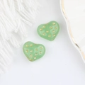 Dettaglio di perline di vetro ceco a cuore verde con pois dorati per gioielli fai-da-te - Verde smeraldo