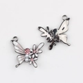 Détail recto-verso de breloques papillon avec émail rose et perles pour bijoux DIY - Noir de Fusil Blanc Rose