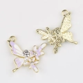 Detailed macro view of lavender enamel butterfly pendant with pearls and rhinestones - Gold Base Purple White