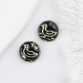 Detailed view of vintage black glass beads with golden bird patterns for DIY jewelry - Black