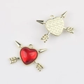 Front and back detail of resin heart pendant charms with gold metal arrows for jewelry making - Gold Red