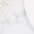 Detailed view of translucent white glass lemon beads with realistic fruit peel texture - White