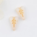 Detail of pink heart-shaped glass beads with vintage gold leaf pattern for DIY jewelry - Jade White