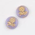 Macro detail of lavender Czech glass sunflower beads with vintage gold hand-painted accents - Purple