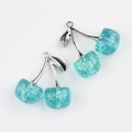 Detail of light blue resin cherry pendants with gold glitter and silver leaves - Silver & Blue
