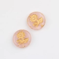Detail of pink translucent Czech glass beads with gold painted sunflower patterns for DIY - Pink