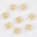 Detail of 10mm square Czech glass beads with hand-painted gold firework patterns - White Jade