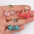 Sparkly resin cherry fruit pendants in pink, red and blue for DIY jewelry making - Random Mix