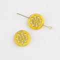 Macro view of Czech glass beads with gold spider web pattern for DIY jewelry making - Bright Yellow (00672701)