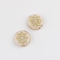 Detailed macro view of Czech glass beads with gold spider web pattern for DIY jewelry - Pink White (00673601)