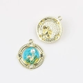 Detail of blue enamel flower pendant with pearl inlay and golden hammered texture - Round Gold Blue