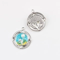Detail of round enamel flower pendant with pearl inlay and textured metal reverse side - Round Silver Blue