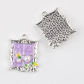 Macro detail of alloy flower pendants with faux pearls and purple enamel garden design - Square Silver Purple Plate