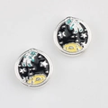 Detailed macro view of vintage astronaut spacer beads with silver finish and enamel - Bright Silver Base Black