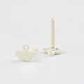 Detail view of white cloud-shaped earring charms with matte spray paint finish - White
