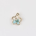 Detail of flower charm with blue enamel, butterfly accent and cubic zirconia stone - Star - Blue