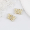 Detailansicht der Vintage-Glasperlen Schmetterling mit Goldverzierungen für DIY-Schmuck - Weiß