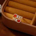 Elegant gold snake-shaped open ring with red agate and sparkling zircon in a velvet box - 18K Gold