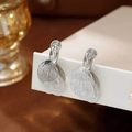 Silver multi-layer fan-shaped tassel clip-on earrings with vertical brushed texture - Silver