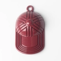 Detailed view of glossy burgundy baseball cap pendant with embossed stitch texture - Red