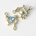 Detailed view of a gold-plated butterfly connector with blue heart gemstone and pearls - Gold Blue