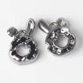 Detail shot of silver rabbit donut pendants with smooth metallic finish for jewelry DIY - Gun Black