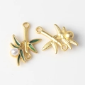 Detailed view of bamboo leaf alloy pendants with green enamel and white pearls for DIY jewelry - Matte Gold