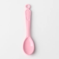 Macro detail of pink alloy spoon pendant with vintage embossed pattern and hanging hole - Pink