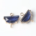 Detail of fan-shaped blue crystal charms with gold-plated edges for DIY jewelry making - Blue