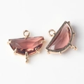 Detail of faceted rose quartz teardrop charms with gold plated frames for DIY jewelry - Red