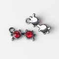 Macro shot of gun-black alloy eyewear charms with red crystals for DIY jewelry making - Gun Black with Red Rhinestone