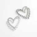 Detail of silver heart pendants with faux pearls and sparkling zircon stones - Silver
