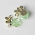 Detailed view of camellia resin flower charms with pearls for DIY jewelry making - Gold Base Green