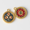 Close-up of colorful alloy enamel pendants with intricate Indian eye and mandala patterns - Blue