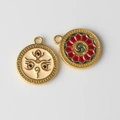 Detailed macro view of colorful alloy enamel evil eye and lotus flower pendants - White