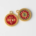 Detail of alloy enamel evil eye pendants with intricate ethnic patterns in gold and red - Red