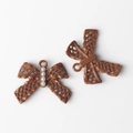 Detail of butterfly alloy pendant with mesh texture and white pearls for jewelry making - Brown Artificial Pearl Bow