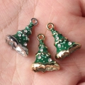 Green enamel Christmas tree pendants with rhinestones on hand for size reference - Random Mix